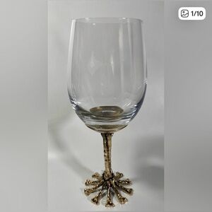 Skeleton bones stemmed wine glass.